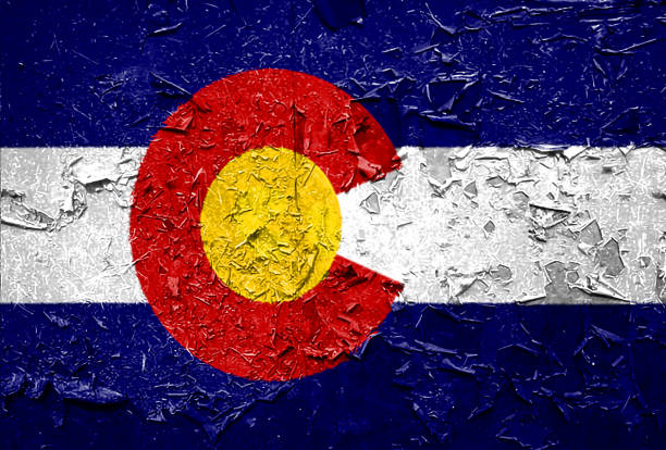 istock Colorado State Flag emblem on metallic texture 1085679176