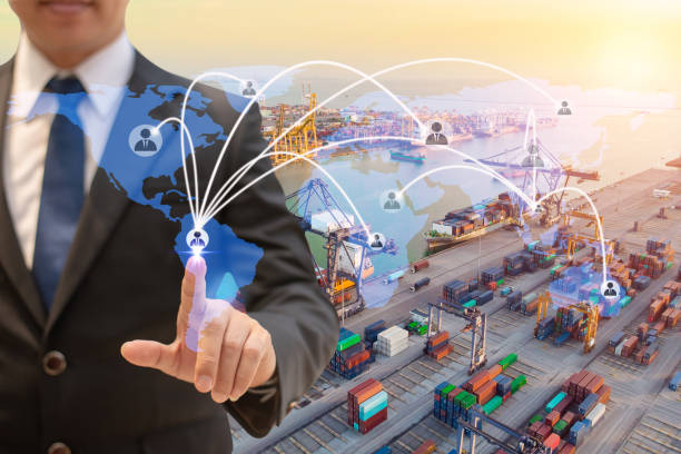 istock Businessman touching icon people on earth world map for network connection,on Logistics and transportation of International Container Cargo ship in the ocean background,Transportation, Shipping. 1085695282