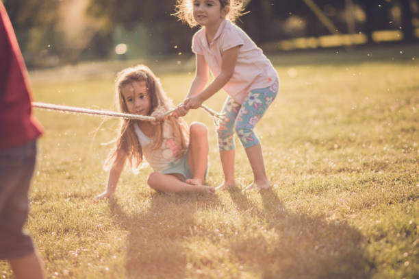istock Children games with a rope 1085698056