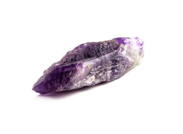 istock Beautiful natural raw amethyst crystal on white background 1085707460