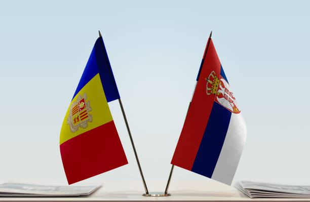 istock Flags of Andorra and Serbia 1085707650