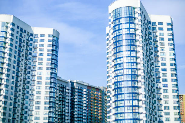 istock modern residential complexes for sale, modern buildings with large windows 1085710348