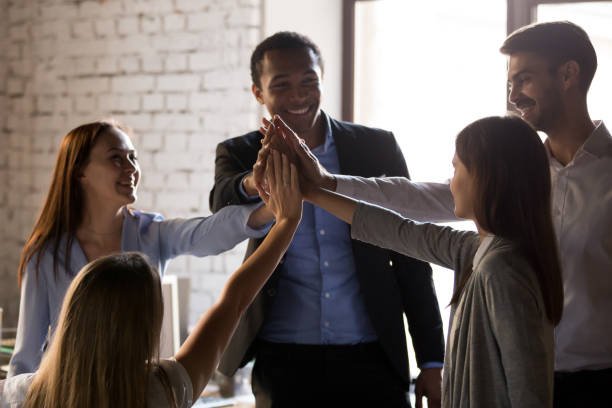 istock Excited multiracial team give high five, teambuilding concept 1085713964