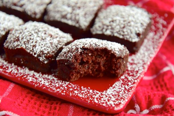 istock Beetroot chocolate brownie with powdered sugar 1085717804