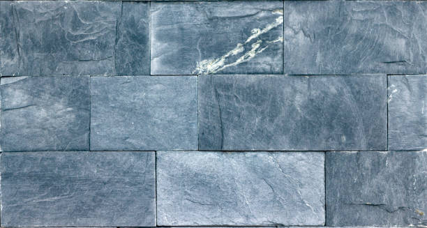 istock artistic sandstone wall texture background patterns A sample of high quality veneer slate 1085719680