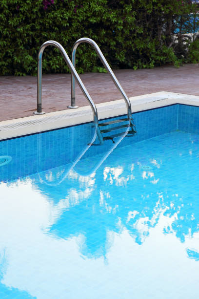 istock metal staircase the pool 1085720772