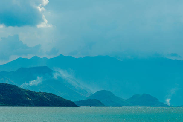 Sea and mountains in a blue haze stock photo