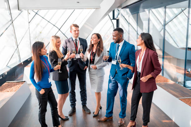 istock Businesspeople celebrating with champagne 1085723004