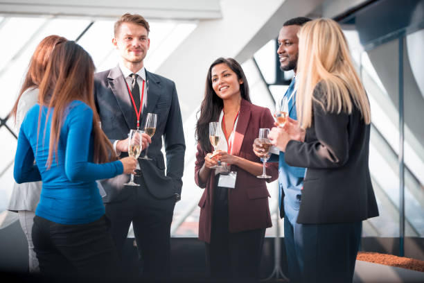istock Businesspeople celebrating with champagne 1085723020