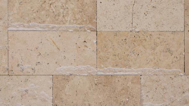 istock Orange facing stone, slate, sandstone and travertine marble texture 1085723388