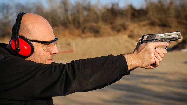 istock Target gun shoot practice and weapons training. Outdoor shooting range 1085735936