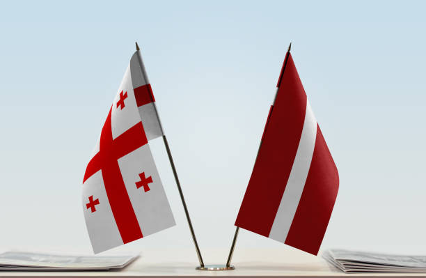istock Flags of Georgia and Latvia 1085737598
