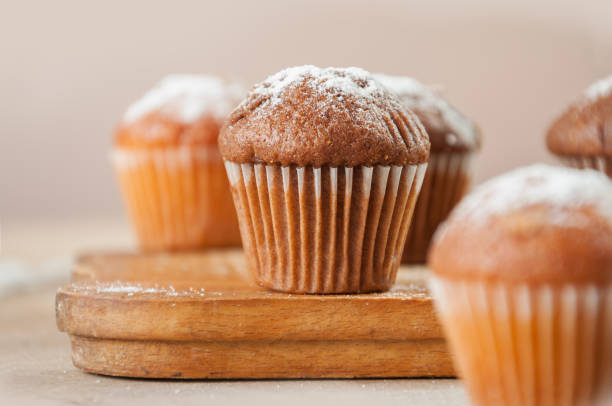 istock Tasty muffin closeup on a wooden board, selective focus. 1085737770
