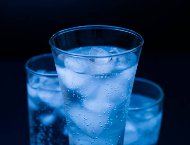 istock Drink. Water glass and ice, dark background 1085747694