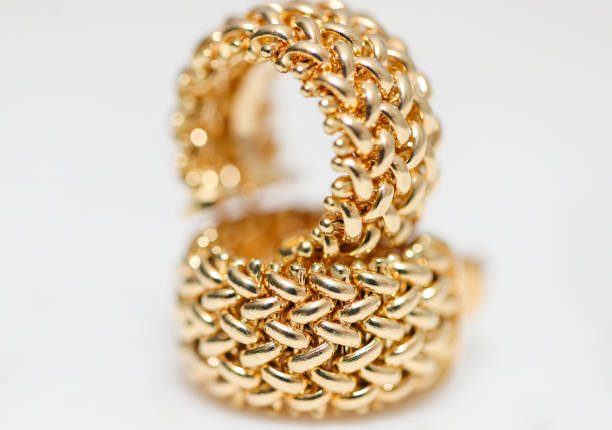 istock yellow gold hoop earrings 1085749538