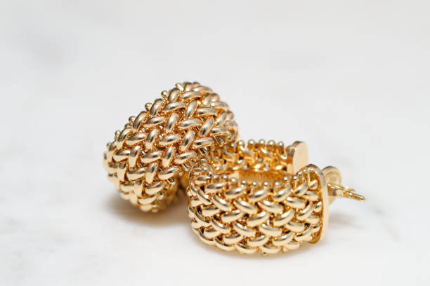 istock yellow gold hoop earrings 1085749542