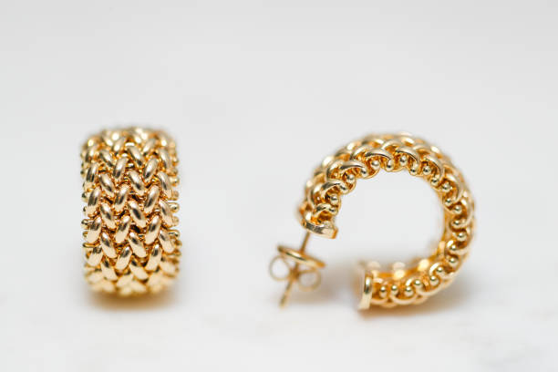istock yellow gold hoop earrings 1085749544