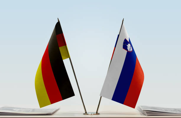 istock Flags of Germany and Slovenia 1085749572