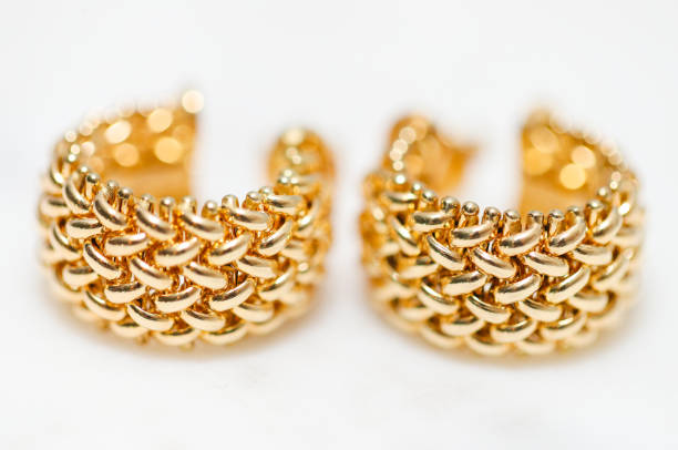istock yellow gold hoop earrings 1085749588