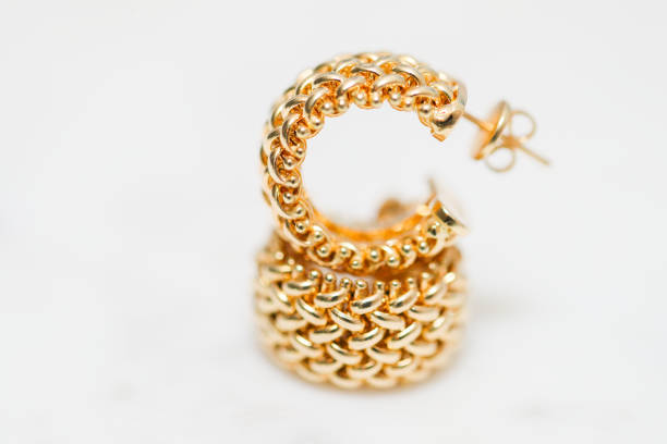istock yellow gold hoop earrings 1085749592