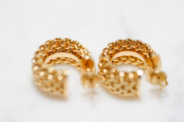 istock yellow gold hoop earrings 1085749600