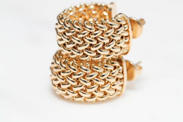 istock yellow gold hoop earrings 1085749612