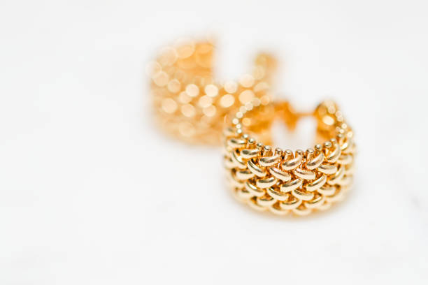 istock yellow gold hoop earrings 1085749616
