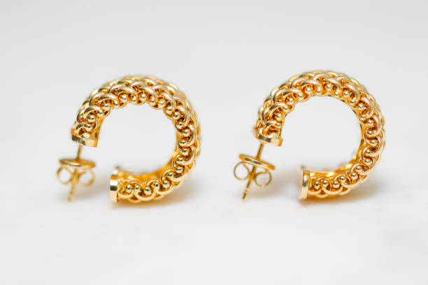 istock yellow gold hoop earrings 1085749622