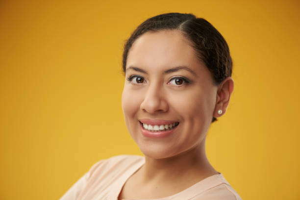 istock Latina headshot color background 1085751494