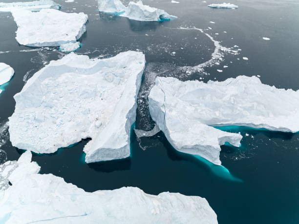 istock Massive Iceberg floating in Arctic Ocean in Greenland 1085754240