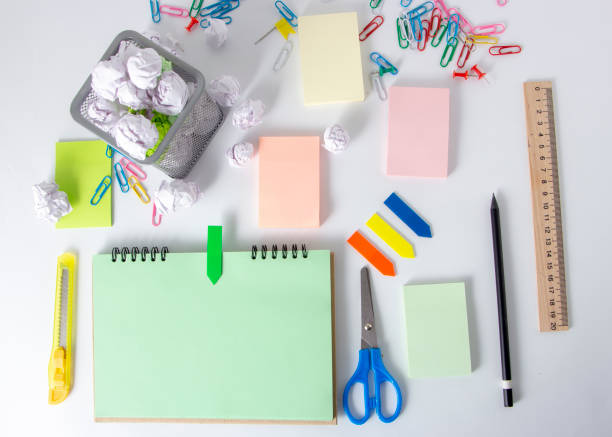 istock School and office supplies on white background with copy space. Top view. 1085757348