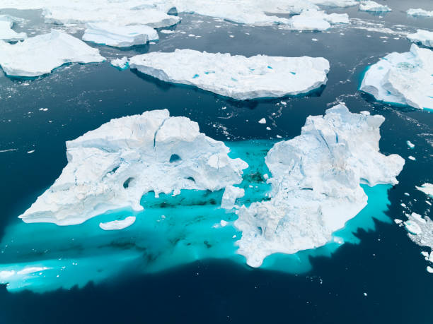 istock Massive Iceberg floating in Arctic Ocean in Greenland 1085758428