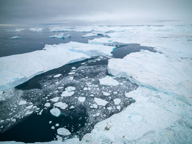istock Massive Iceberg floating in Arctic Ocean in Greenland 1085758550