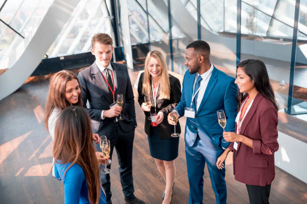 istock Businesspeople celebrating with champagne 1085758982