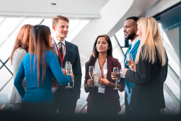 istock Businesspeople celebrating with champagne 1085758996