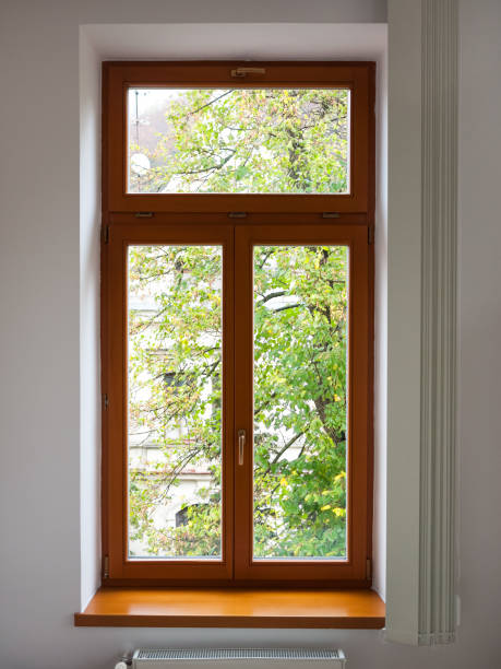 Modern interior with wooden windows and rolled shutters