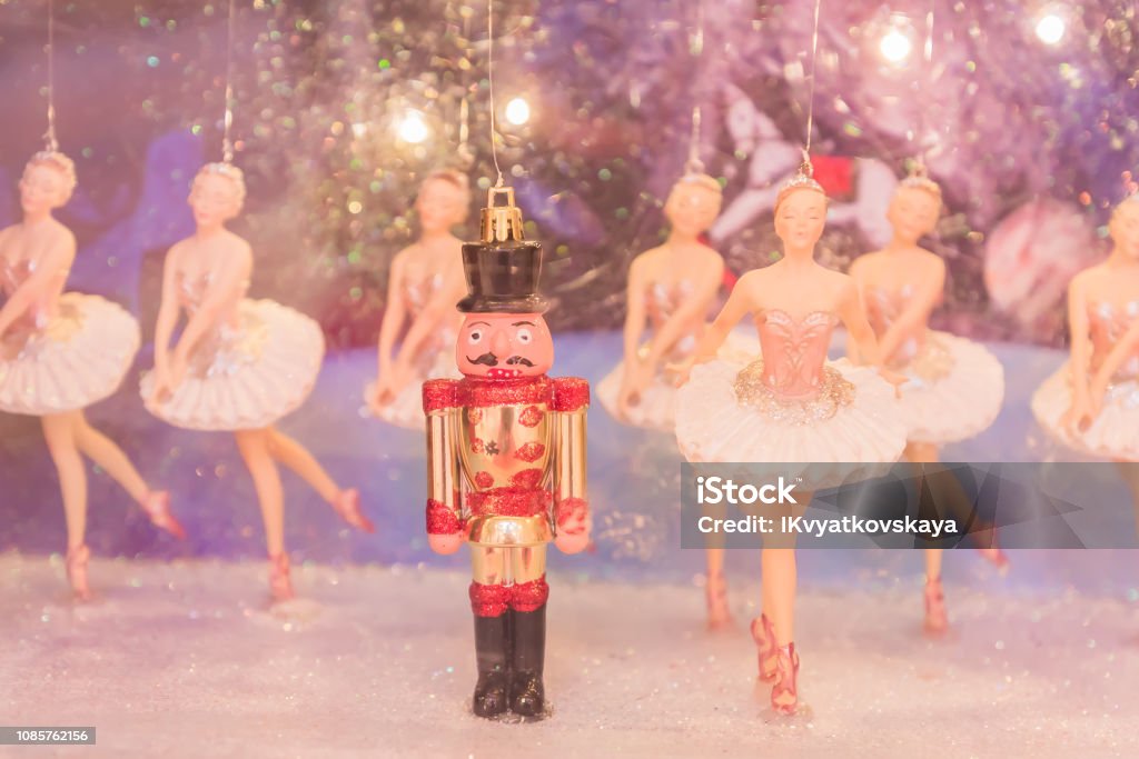Christmas nutcracker toy soldier and balerina dolls on the stage. Famous Russian Ballet installation. Nutcracker Stock Photo