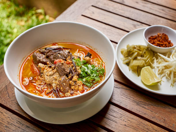 istock Rice noodles with spicy pork sauce. 1085765818