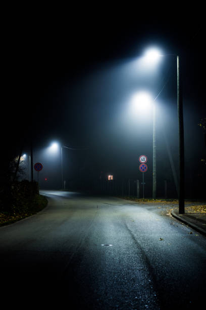 istock A country asphalt road at night, Latvia 1085772980