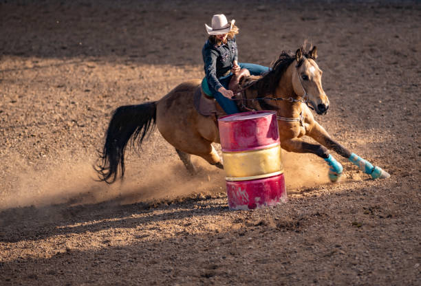 Cowgirl barrel racing at a local rodeo arena