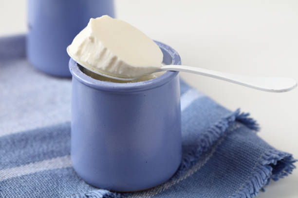 Natural yogurt in blue jars
