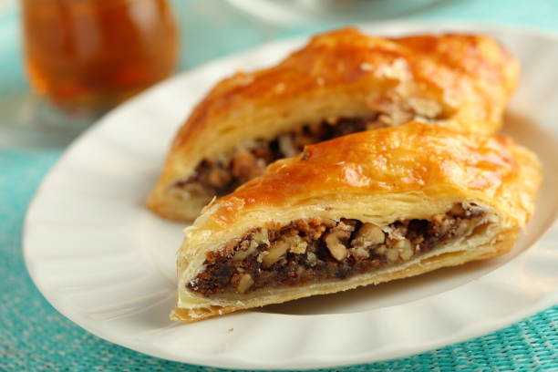 istock Turkish sweet pastry baklava with nuts and tea 1085778764