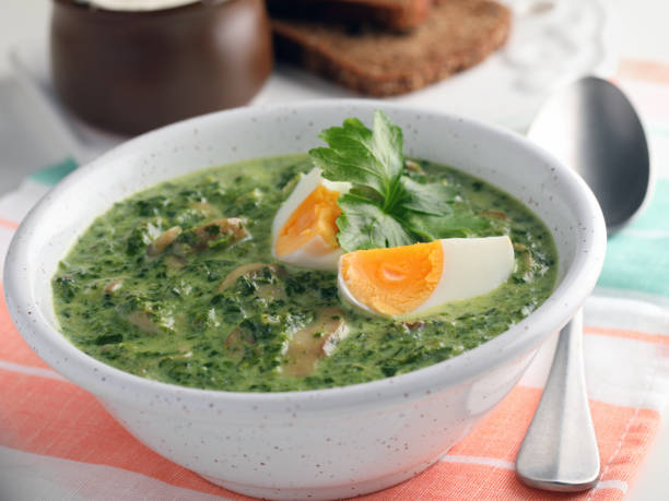 istock Spinach cream soup with mushrooms and boiled eggs 1085779040