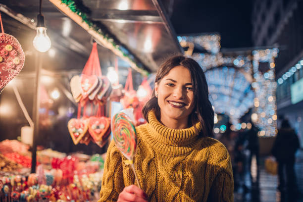 istock Smiling girl buying candy 1085781764