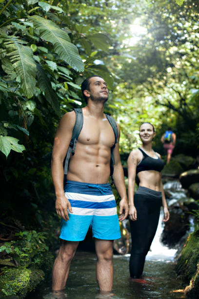 istock Friends walking in the woods 1085782796