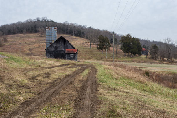 istock Vintage barn in large pasture with rolling hills 1085786742