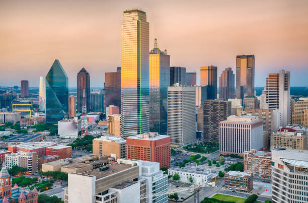 Dallas City Skyline Sunset Aerial view of Dallas, Texas city skyline at sunset dallas texas stock pictures, royalty-free photos & images