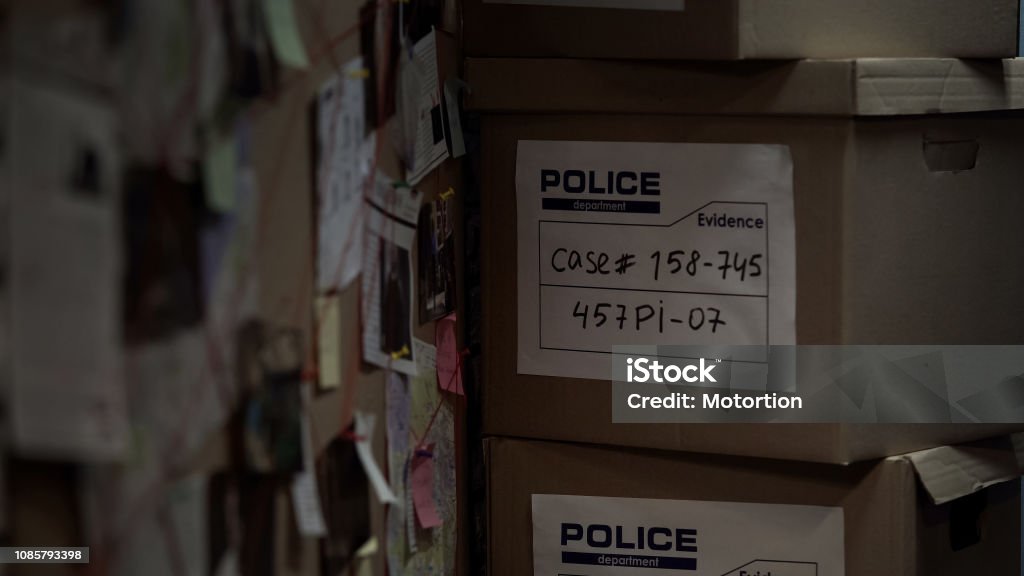Boxes with evidential materials at police office, investigation process, case Police Force Stock Photo
