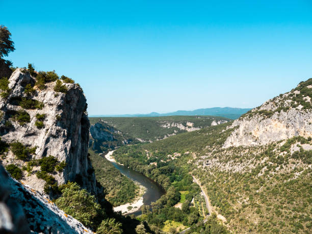 istock Panoramic view over Massif Central and the river Ardeche 1085800316