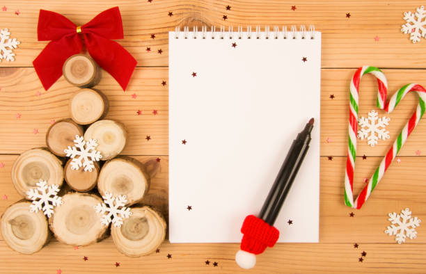 istock Christmas tree and notebook for Santa letter. 1085803226